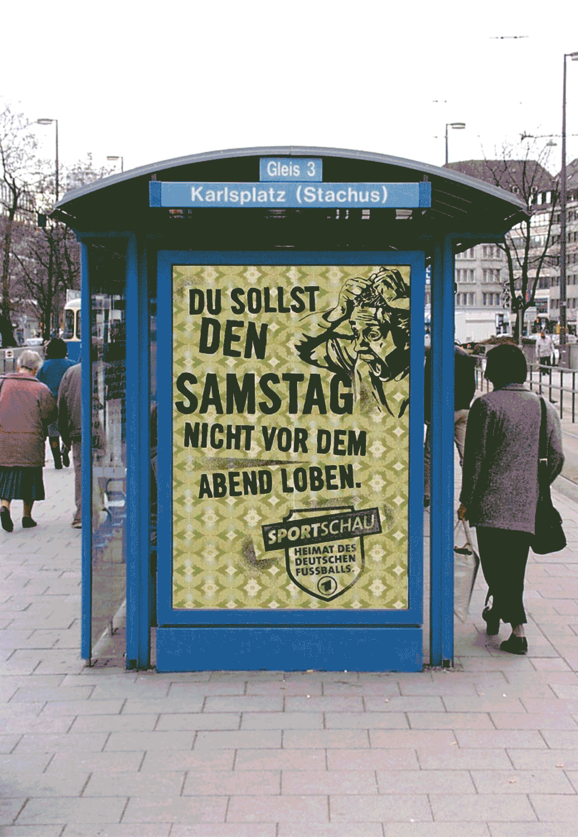 barber using styling spray on young man with black hair, short on sides and long in a quiff on top