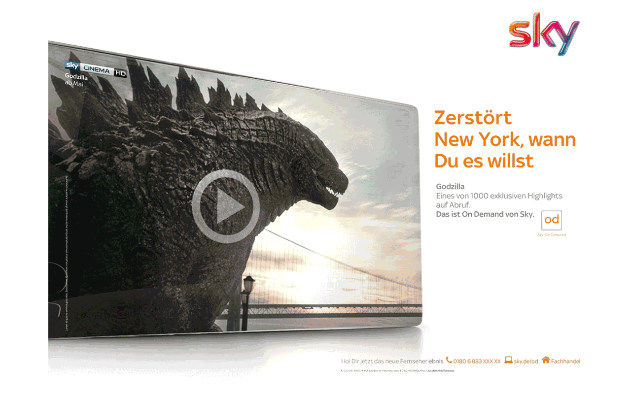 man with quiff and brown tinted sunglasses wearing a fur collar